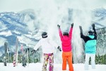 skiers-team-having-fun-snowy-mountains